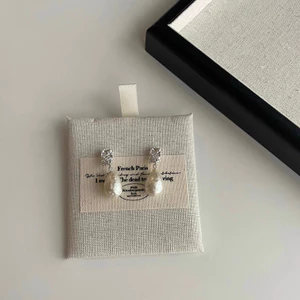 Pháp retro khí chất lãng mạn ngọc trai hình học giọt nước mặt dây chuyền bạc cá tính bông tai nữ đa năng