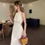 Rỗng lộ eo Sling Váy dài buộc dây phong cách eo hẹp + Thiết kế viền mùa hè Phong cách kỳ nghỉ hè Slimer Look Temperament Dress