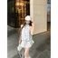 Đầm nơ kiểm tra cổ dây cho nữ Cảm giác cao cấp mùa hè 2026 Phong cách mới Hot Girl Pure Desire Váy Vest không tay