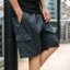 Quần short chở hàng màu trơn nhẹ mùa hè dành cho nam, Quần short thể thao dáng rộng cỡ lớn