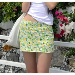 Váy chanh tươi Phong cách mới Váy ngắn Hot Girl Phong cách du lịch kỳ nghỉ