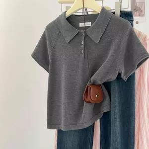 Áo ngắn tay có dây đeo vai chính hãng dành cho nữ Nút màu trơn Phiên bản Hàn Quốc Bao da thịt Slimer Look polo Col