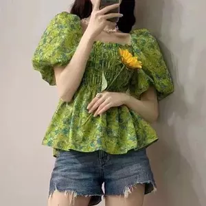 Quần áo mùa hè mm béo nữ Phong cách mới Pháp Tay phồng siêu cổ tích Áo sơ mi hoa cổ vuông hợp thời trang một vai