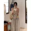 Mùa Hè 2026 Phong Cách Mới Hàn Quốc Retro Hoa Sling Áo Sơ Mi Nhỏ Nữ Phong Cách Kỳ Nghỉ Ngọt Ngào Dễ Thương Top