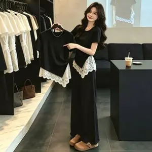 Mùa hè Phong cách mới Kích thước lớn viền không đều Thiết kế khâu ren thon gọn hơn Áo thun ngắn tay Quần áo nữ