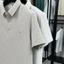 Áo sơ mi Polo nam mùa hè VN thoáng khí, sử dụng chất liệu lụa băng, thiết kế ngắn tay, thích hợp để mặc thường ngày và công sở.