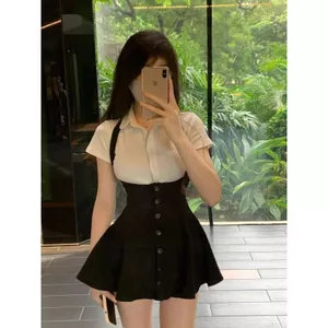 Váy treo nhỏ khí chất Eo cao Đơn ngực màu đen mỏng hơn Nhìn chữ a Váy ngắn nữ mùa xuân hè Váy phong cách mới