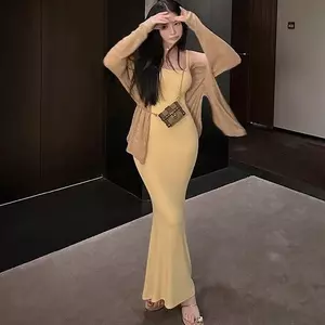 Váy treo màu vàng phong cách hoàng gia mùa hè dành cho nữ Váy dài đuôi cá co giãn eo hẹp Váy dài gói hông thuần khiết khao khát khoe cơ thể của bạn hẹn hò
