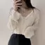 Áo len dệt kim rỗng bên ngoài dáng rộng mặc bên ngoài kiểu mỏng Vỏ bọc thịt ngắn + Sling