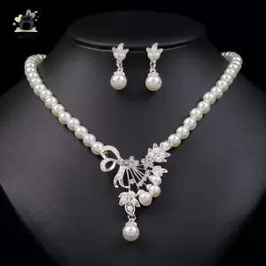 Bộ bông tai dây buộc ngọc trai châu Âu và Mỹ hình giọt nước Váy tính khí nữ Bông tai ren mới