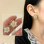 Bông tai đính hoa mạ vàng tinh tế với cánh hoa trong suốt: Trang sức thanh lịch