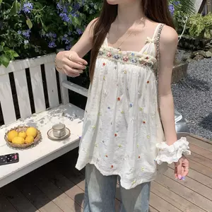 Phong cách mới Kỳ nghỉ ngọt ngào Công nghiệp nặng Áo Vest thêu đầy màu sắc Sling 2026 Áo thiết kế rộng rãi mùa hè không tay