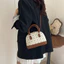 SQ11 Vintage Pháp niche shell túi xách 2026 thời trang mới phong cách Hồng Kông