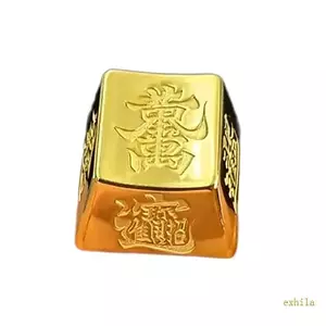 Bàn phím đồng thau tông màu vàng sang trọng exhila được trang trí bằng các nhân vật Trung Quốc