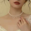Phong cách nữ ngọc trai hai lớp kiểu Pháp, thích hợp và cao cấp, kết hợp với vòng cổ áo len
