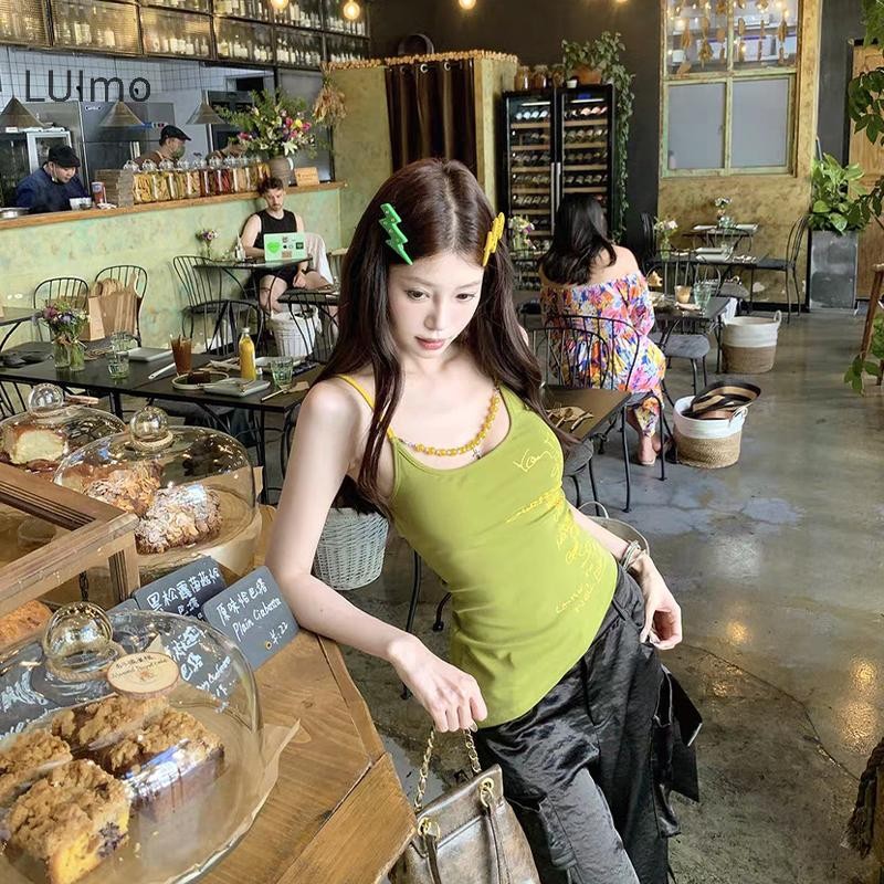 Áo sơ mi nữ style hiện đại, in chữ màu cam, dáng slim fit