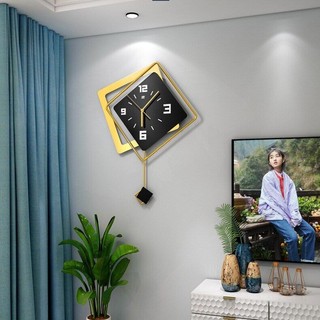 Đồng hồ treo tường xoay hiện đại Phòng khách Bắc Âu Thời trang treo tường Đồng hồ trang trí tường Đồng hồ