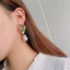 Thời Trang Hàn Quốc Hoa Tinh Tế Độc Đáo Phong Cách Dài Tính Khí Bông Tai Ngọc Trai Sang Trọng Bán Buôn