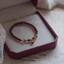 Rượu vang đỏ Garnet Lily of the Valley Vòng tay pha lê dâu tây Phong cách mới Niche Phụ kiện nữ thanh lịch