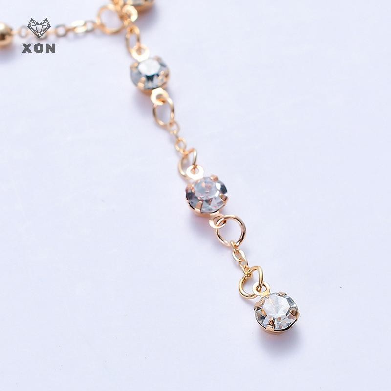 Trang sức cơ thể nữ với vòng cổ và dây chuyền eo gợi cảm, phù hợp đi biển sang trọng