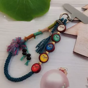Mặt dây chuyền thần tài năm chiều Tây Tạng Dây chuyền điện thoại di động Móc chìa khóa Ba lô Đồ trang trí dệt tay 6.22