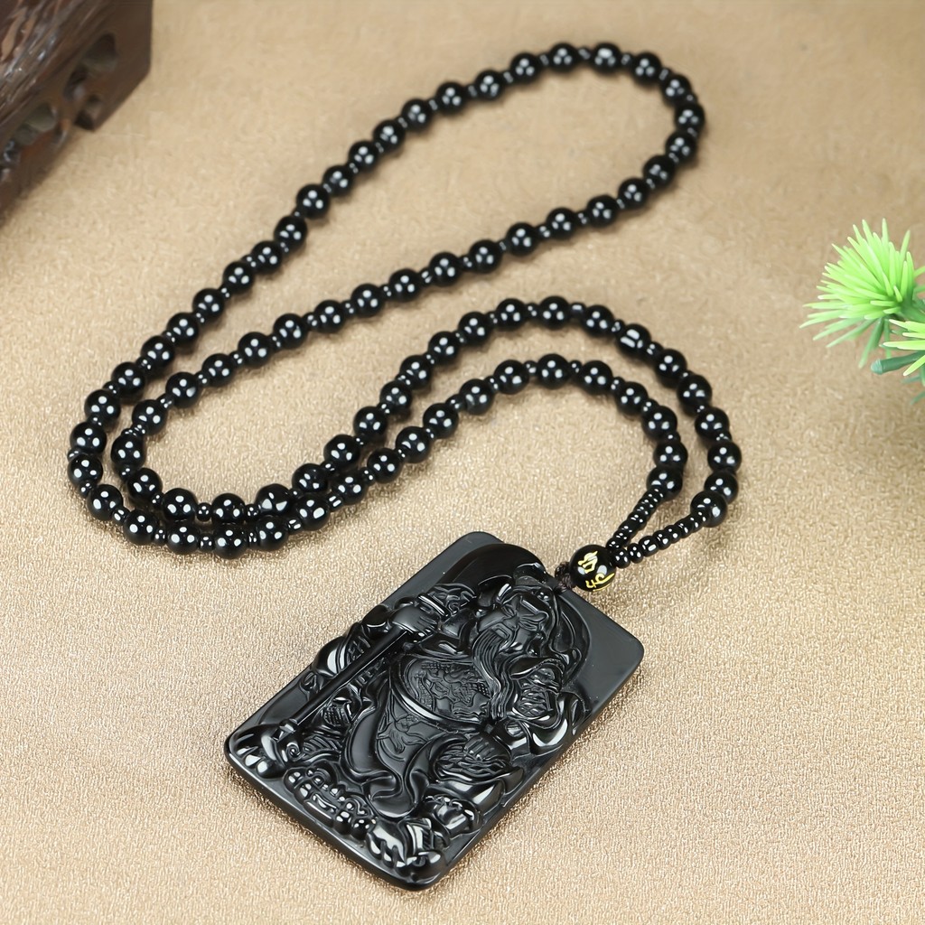 Mặt dây chuyền obsidian thanh lịch, làm từ đá tự nhiên, là bùa hộ mệnh mang ý nghĩa tinh thần mạnh mẽ.