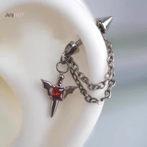 Bông tai nam nữ điệu gothic màu bạc với zircon và đinh tán xương, phù hợp xu hướng Y2K - Massivedeals