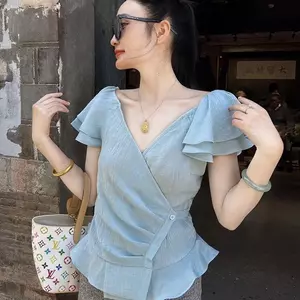 Mùa hè Pháp lãng mạn Top Tính khí đẹp cao cấp Cảm giác màu xanh cổ chữ v Xù Áo sơ mi eo móc