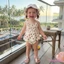 Bộ áo liền quần không tay viền in hình dâu tây có mũ chống nắng