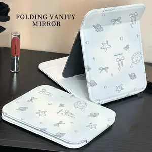 Gương gấp mini họa tiết nơ sao biển nền xanh gương cầm tay mini