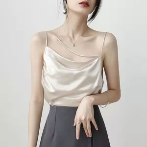 Màu trắng tinh tế không tay cao cấp Thiết kế yếm bên trong gợi cảm Niche Áo ngoài