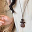 Mới Phong Cách Trung Hoa Màu Nâu Mặt Dây Chuyền Áo Len Dây Xích Nữ Retro Phong Cách Dân Tộc Dài Vòng Cổ Niche Zen Cao Cấp Cảm Giác