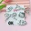 Set Charm 6 Món Hello Kitty Nơ Đôi Bạc Chấm Bi Cao Cấp – Cá Nhỏ Kawaii Trang Trí Dép 3D Dễ Thương