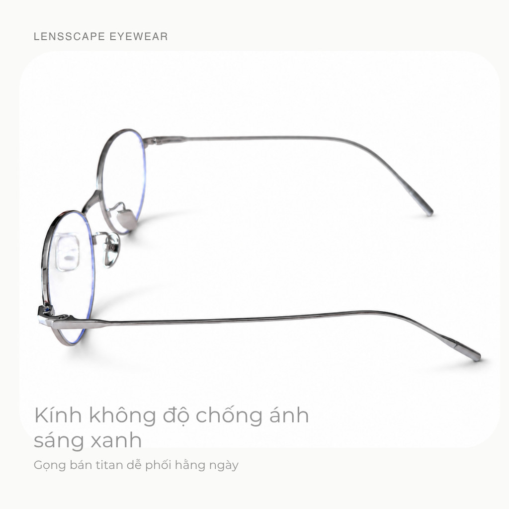 Kính chống ánh sáng xanh mặt mộc không độ, gọng bán titan dáng oval