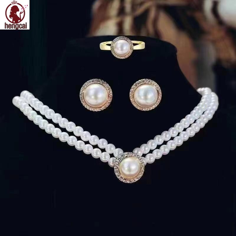 Bộ trang sức ngọc trai thanh lịch cho bé gái gồm bông tai, vòng cổ và vòng tay