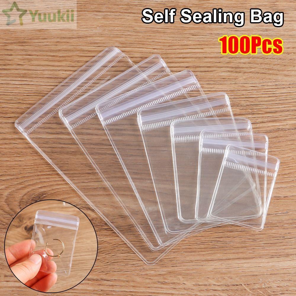 YUUKII 100 chiếc túi tự niêm phong, túi khóa zip trong suốt có thể đóng lại, nhựa PVC chống bụi, bao bì quà tặng, túi đựng trang sức