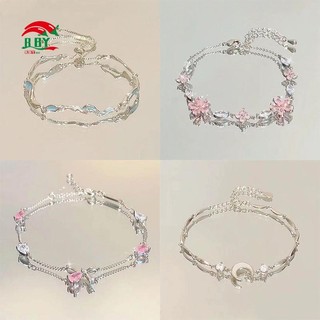 Vòng tay hình ngôi sao hoa anh đào zircon màu hồng, phù hợp cho nữ với vẻ đẹp sang trọng và cao cấp.