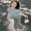 Bé gái (80-120) Mùa hè Phong cách mới Áo thun chấm bi giả hai mảnh thời trang + Quần loe