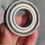 Khuyến mãi giá thấp Nhập khẩu Tháo gỡ Vòng bi hai tay 6205ZZ Sản phẩm hạng nhất Cảm thấy tốt Nguyên bản Dầu gốc 95% Mới 42R1
