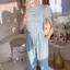 Bộ đồ thời trang Sweet Girl Dây đeo dây mùa hè Áo ngắn cay ngọt ngào + Quần ống rộng thể thao Bộ đồ hai mảnh