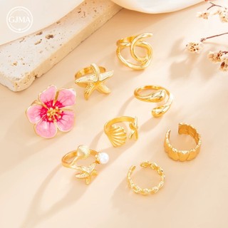 Kim loại nhỏ giọt dầu ngọc trai sao biển vòng hoa phụ kiện thời trang đơn giản cho nữ