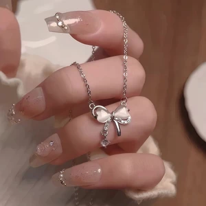 Mắt Mèo Nơ Tua Rua Vòng Cổ Nữ ins Phong Cách Niche Thiết Kế Cô Gái Trái Tim Xương Đòn Dây Chuyền 2026 Phong Cách Mới GT84