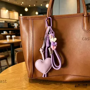 Mặt dây chuyền túi CAST, Thiết kế quà tặng Dây bện bằng da trái tim Móc khóa hình trái tim sành điệu Trang trí quyến rũ bằng da PU Túi trái tim quyến rũ Sử dụng chìa khóa xe hơi