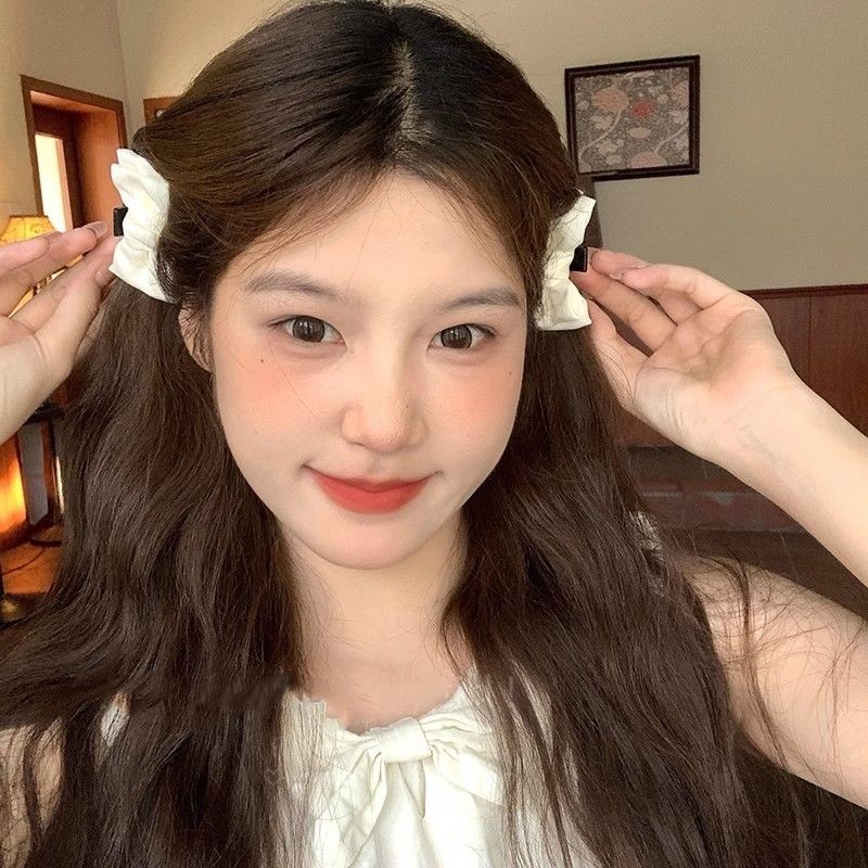 Kẹp tai Elf bên nơ nhỏ