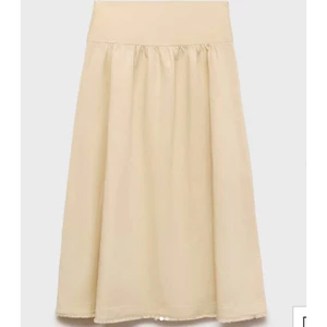 CHÂN VÁY DÀI MNG MÀU KEM - 17052537