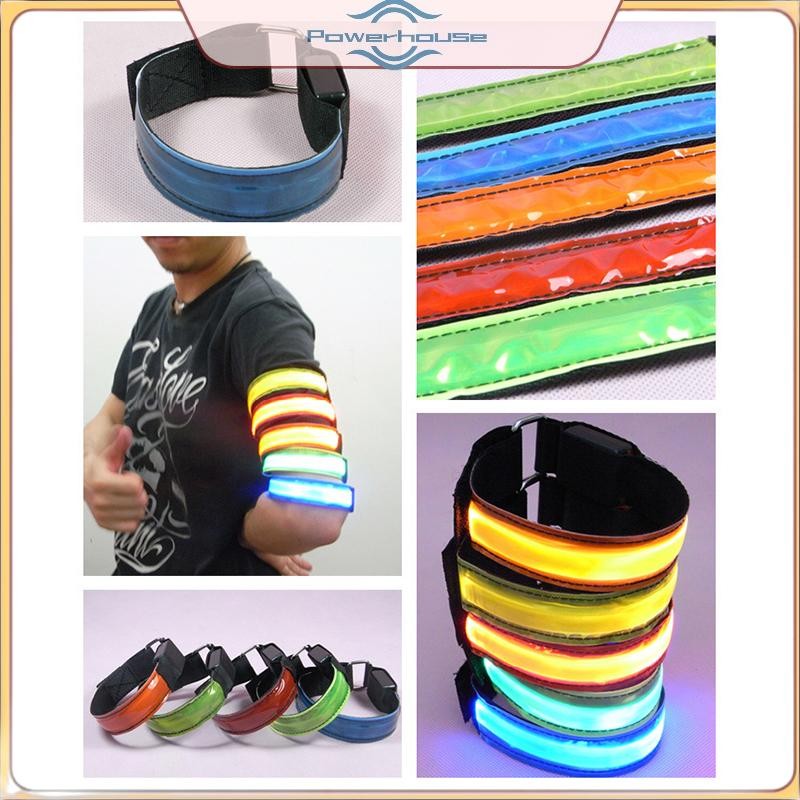 Dây đeo tay dạ quang với đèn LED phản quang, dùng cho cổ vũ và cảnh báo an toàn, sạc bằng USB.