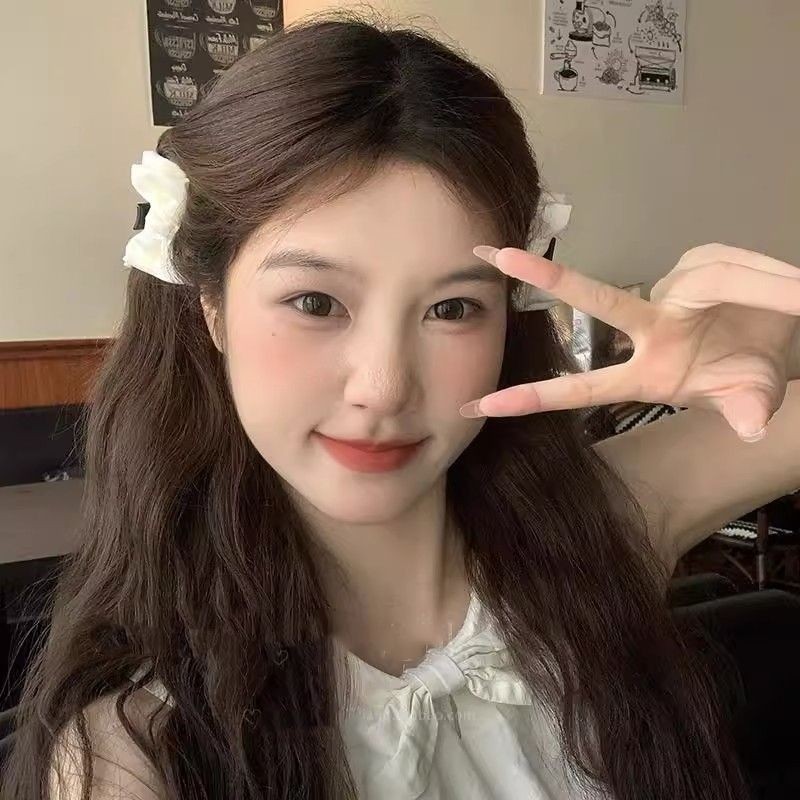Kẹp tai Elf bên nơ nhỏ