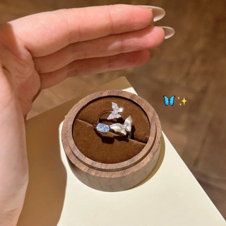 Nhẫn nữ giọt nước xanh topaz với thiết kế cánh bướm, phong cách thoáng mát