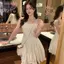Mùa Hè 2026 Phong Cách Mới Tinh Tế Ánh Trăng Trắng Không Tay Nhẹ Nhàng Cao Cấp Slim-fit Váy Ôm Hơn