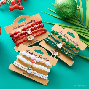 Vòng tay đính cườm chủ đề Giáng sinh với thiết kế ông già Noel và người tuyết, phù hợp thời trang